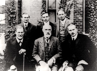 A group photograph, showing Sigmund Freud, Stanley Hall and Carl Jung